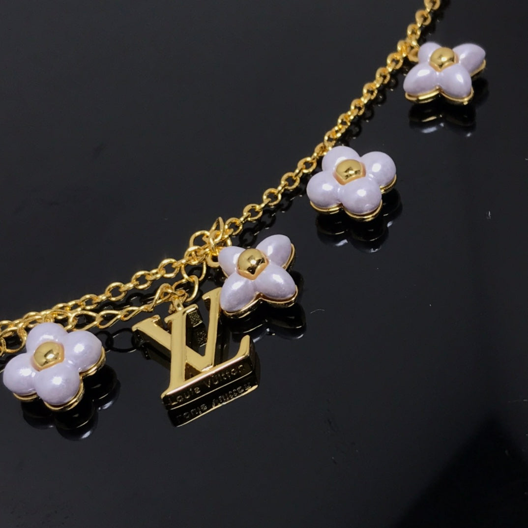 [Lucky Star]LOGO 6 MOTIF STAR AND SUN GOLD BRACELET